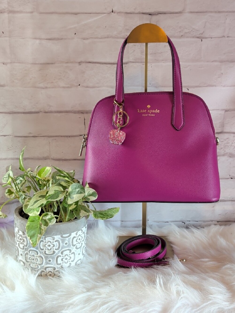 kate spade fuchsia leather satchel with gold hardware andApple Bag Charm